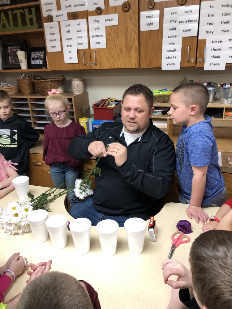 Vice Principal Helling helping with Science Experiment